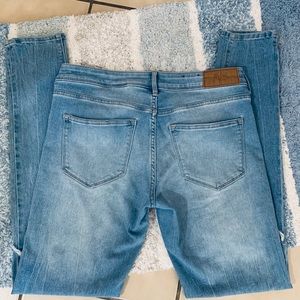 H&M distressed skinny jeans